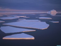     - Broken Fast Ice Under the Midnight Sun and Impending Storm Edward VIII Bay Kemp Coast Antarctica